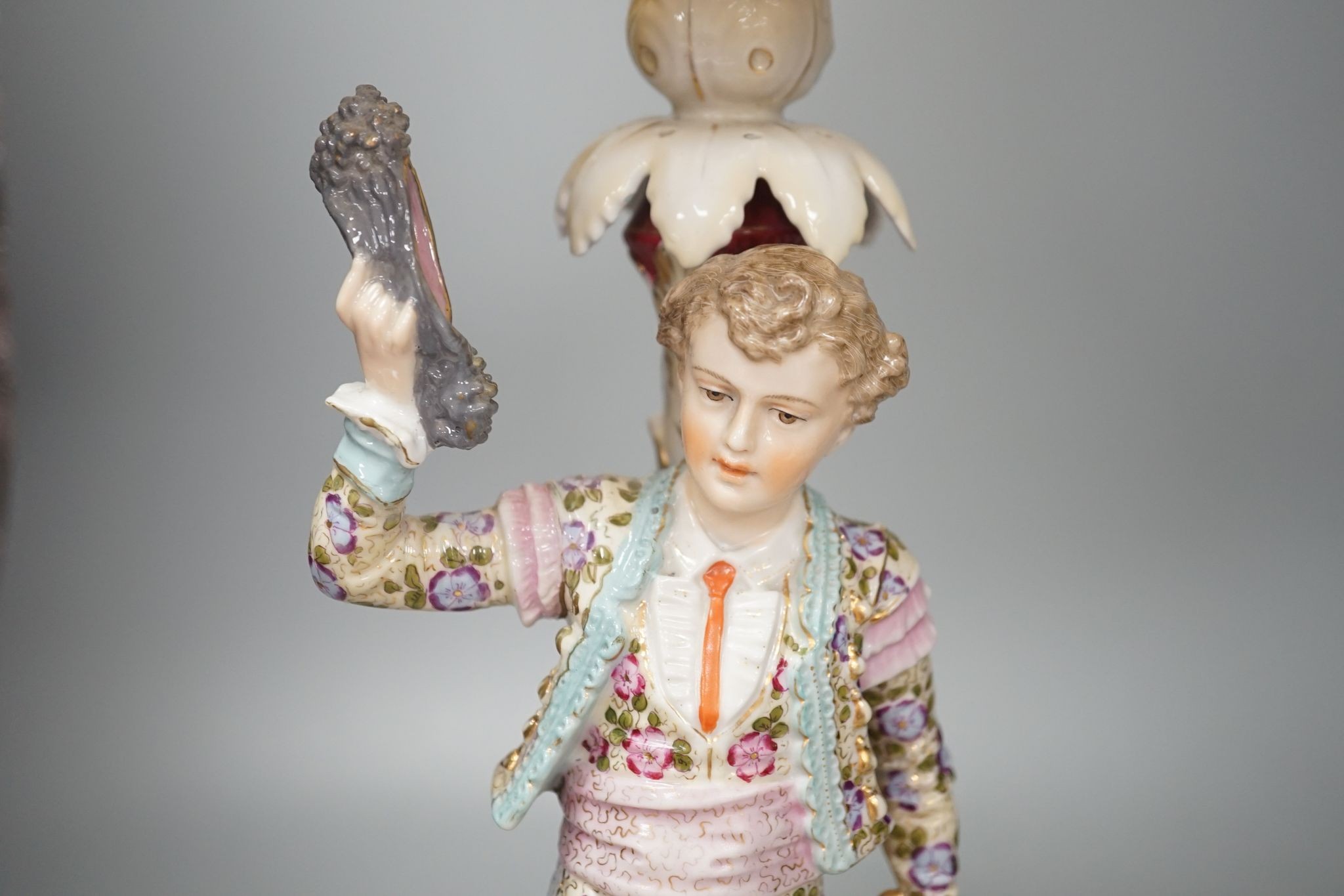 A German porcelain 'matador' lamp and shade 57cm total